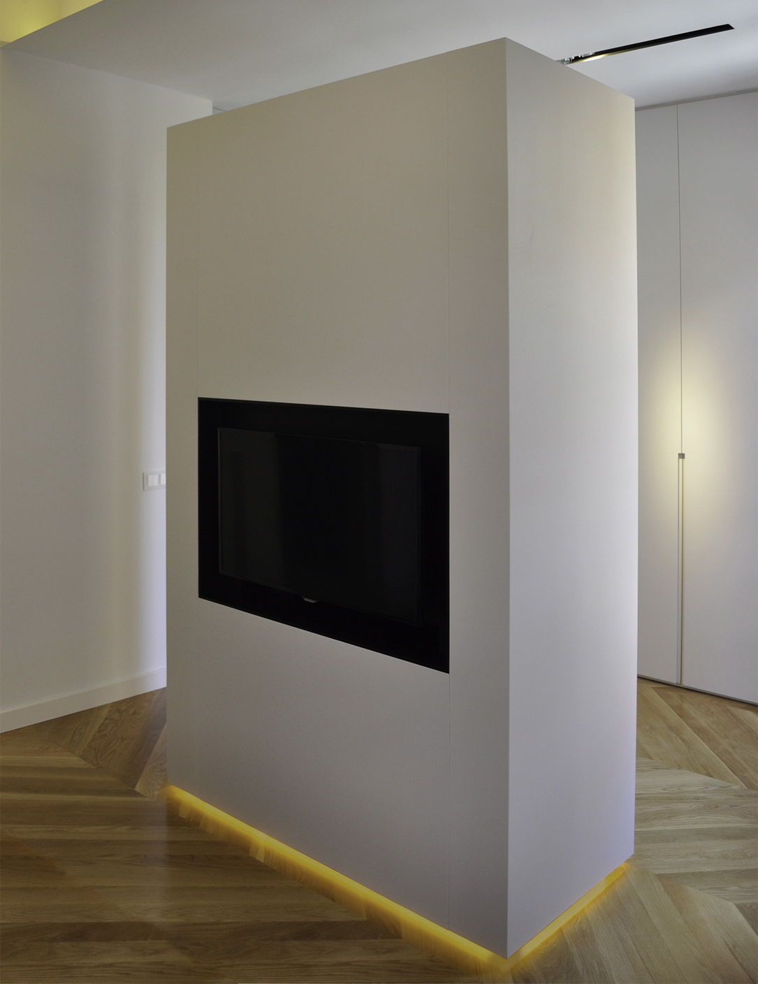 a television integrated in a freestanding wall