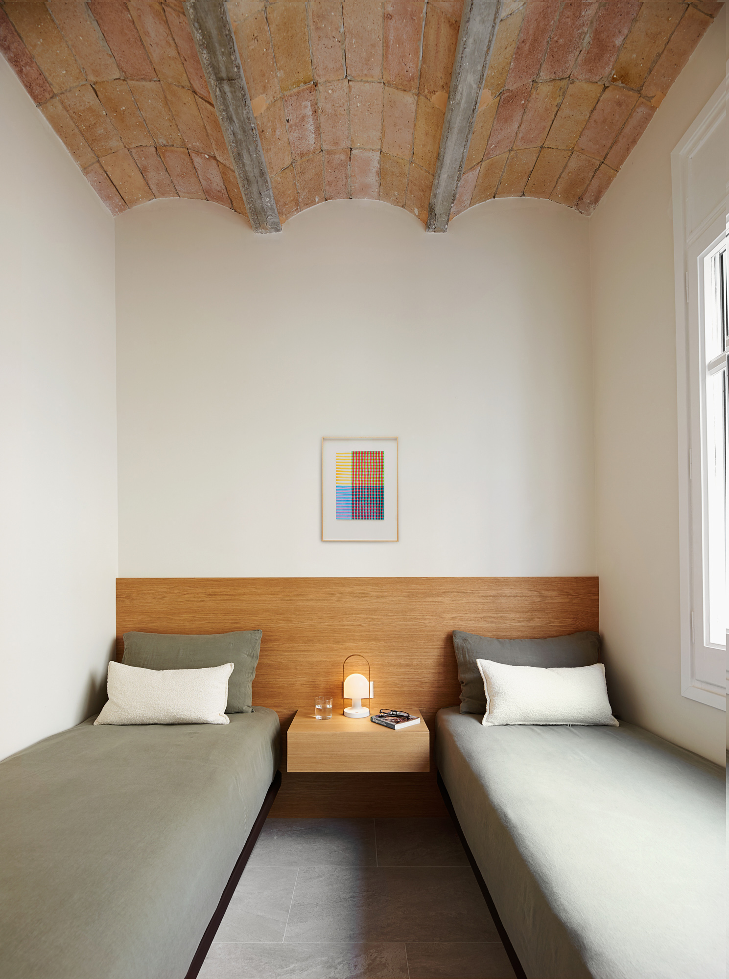 minimalist modern guest bedroom with brick ceiling